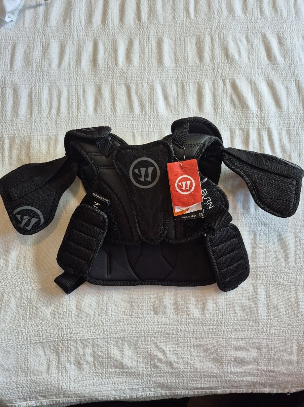 Warrior Burn Next youth Medium lacrosse black adjustable shoulder/chests pad NWT